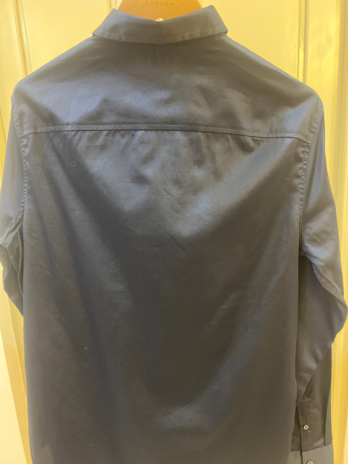 Armani Exchange long sleeve shirt in navy features a distinctive white contrast piping running down the center placket