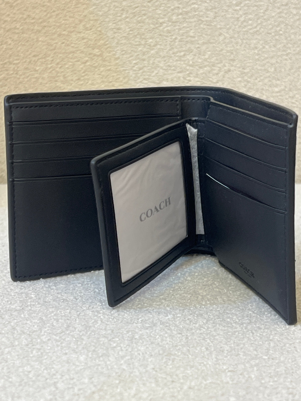 COACH Men's CA001 3-in-1 Wallet in Blocked Signature Mahogany Multi, featuring signature coated canvas and refined calf leather