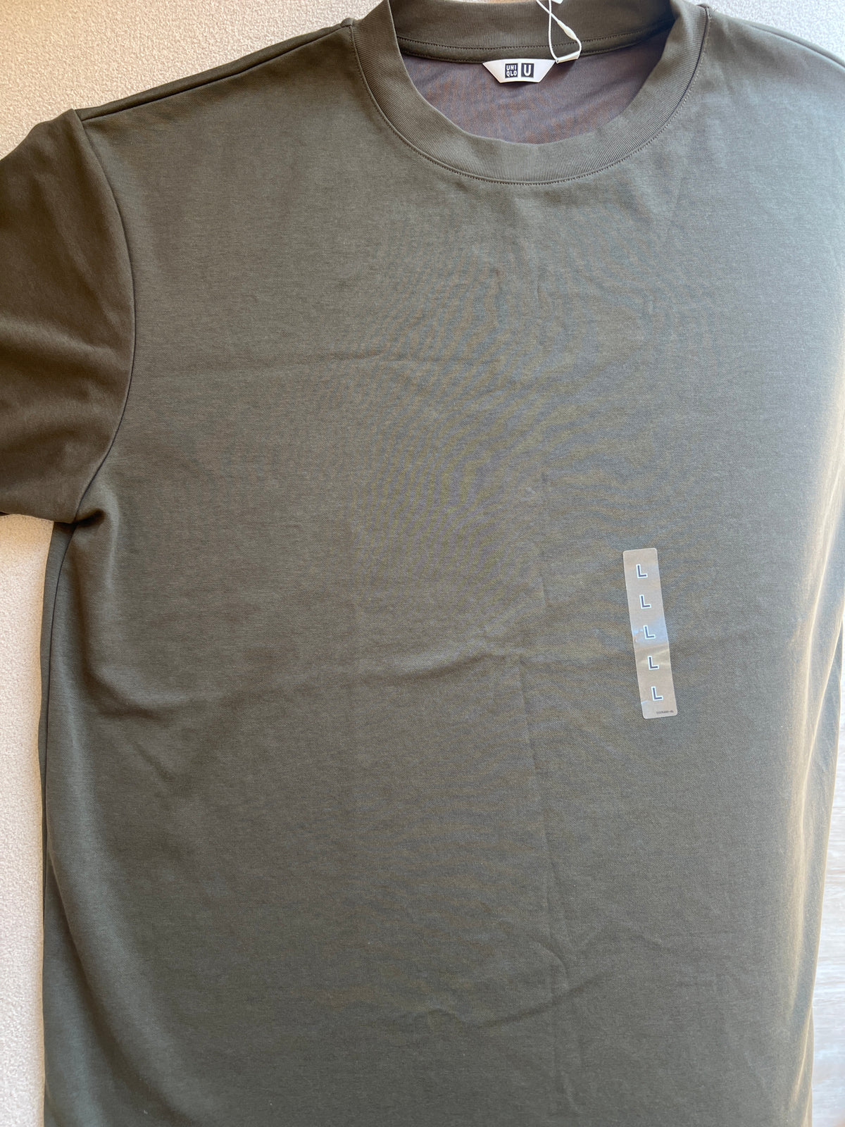 Uniqlo AIRism Cotton Oversized Crew Neck T-Shirt in a olive green color