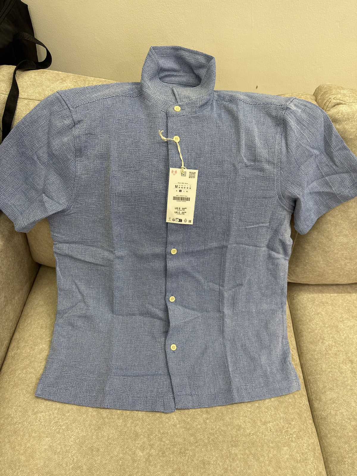 This blue textured long-sleeve shirt is a Zara brand