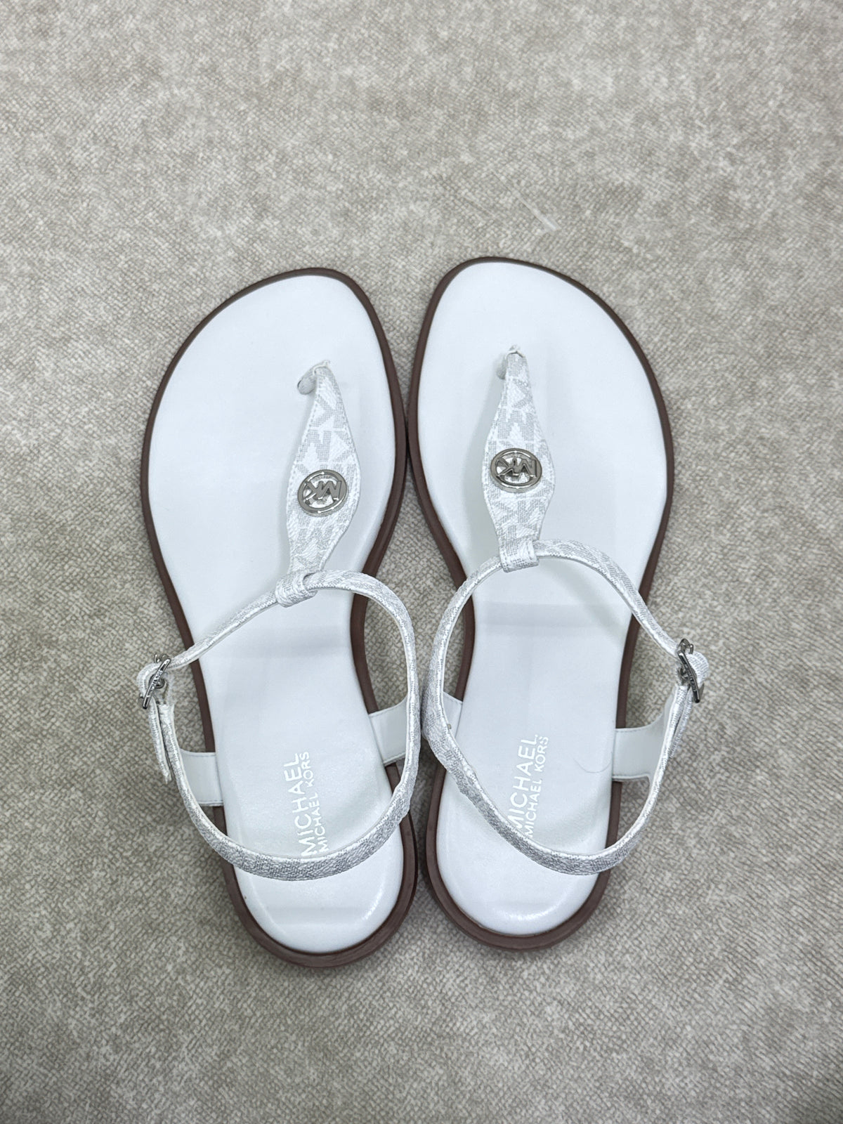 Pair of Michael Kors Mallory Signature Logo T-Strap Sandals in Bright White