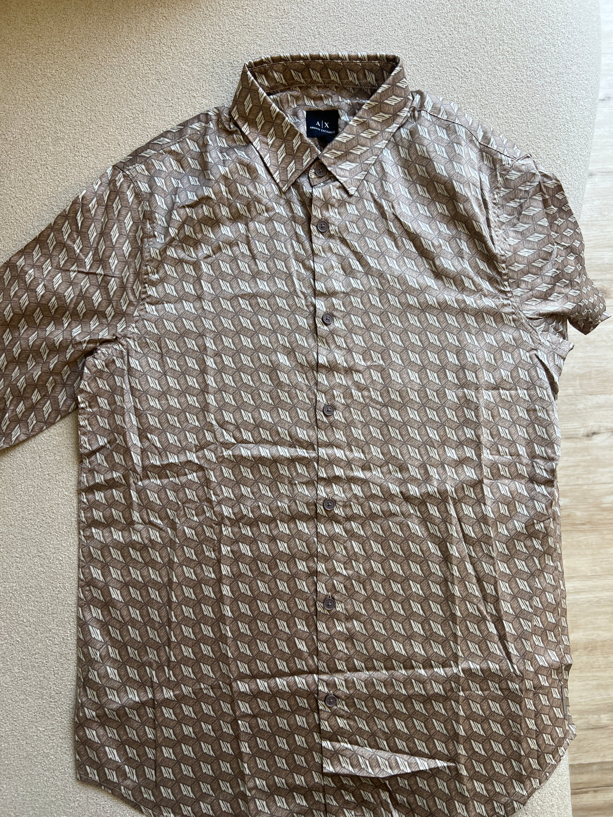 Armani Exchange beige shirt featuring an allover geometric logo print