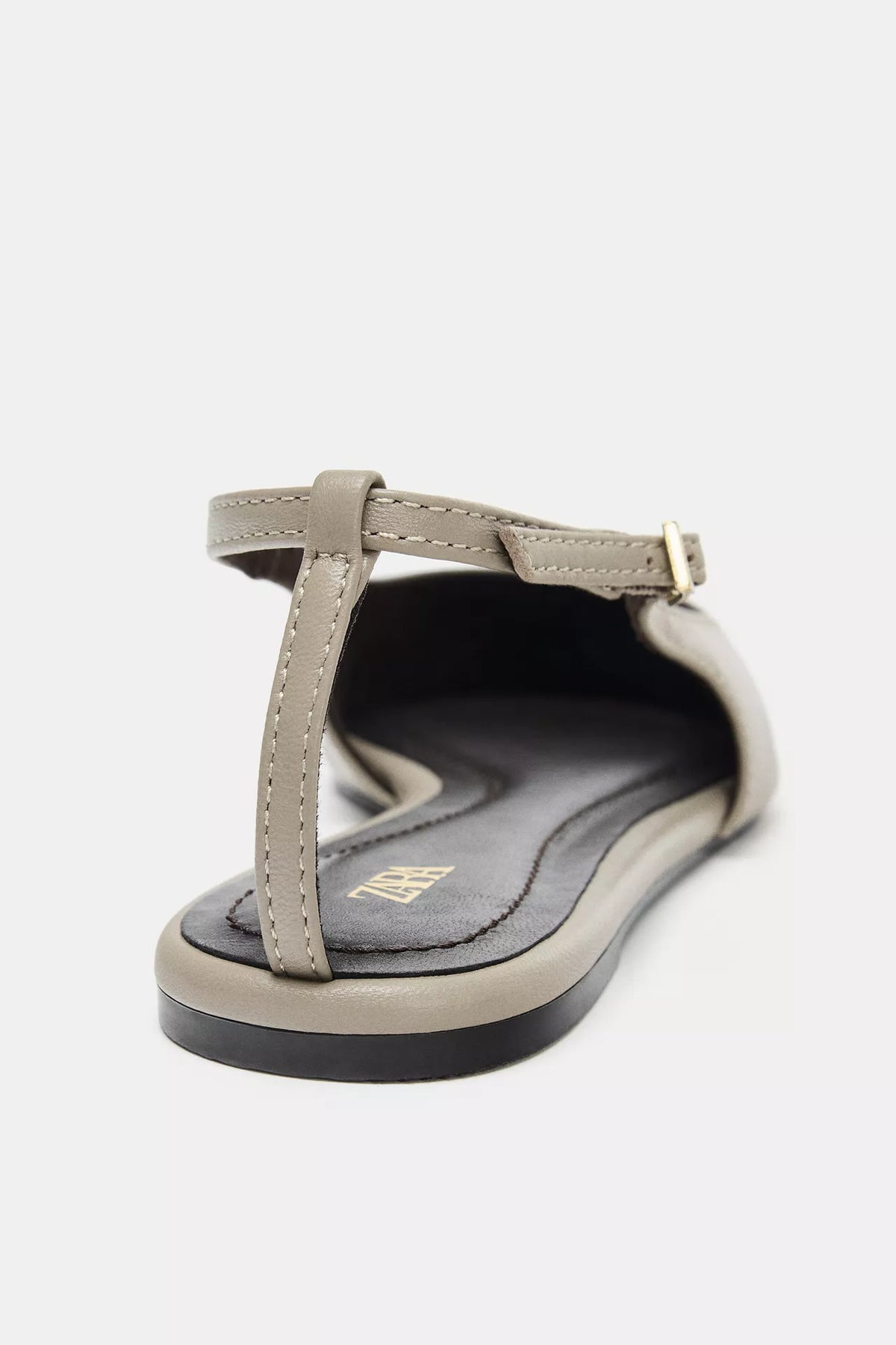 taupe leather slingback shoes are from Zara
