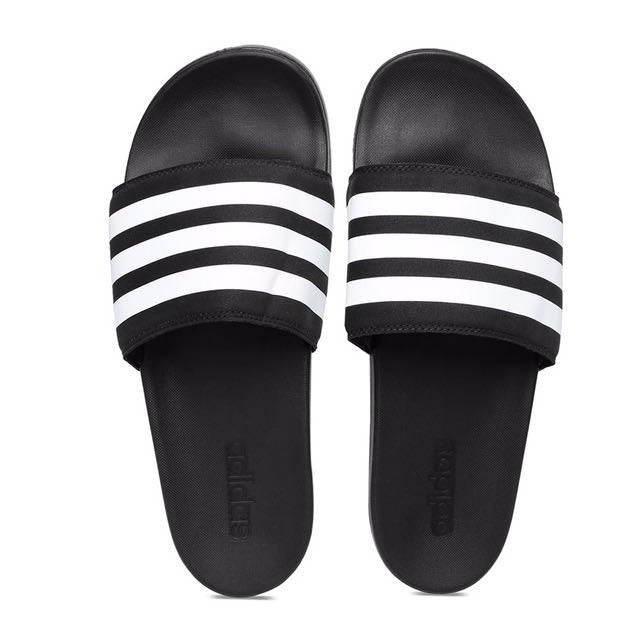 Pair of Adidas Adilette Comfort Slides in core black and white