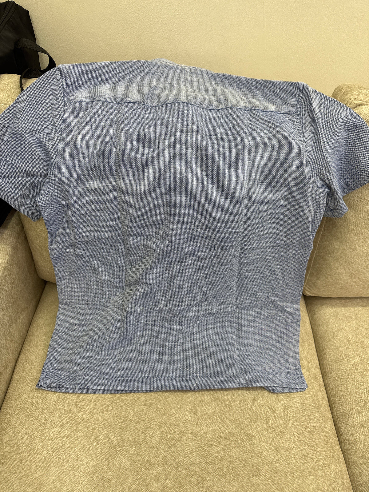 This blue textured long-sleeve shirt is a Zara brand