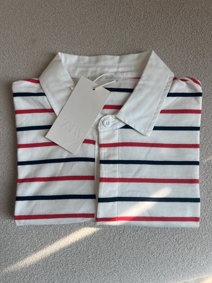 White polo ZARA T-shirt with red and black stripes, similar to those offered by brands like Liberty Blues or J.Crew Factory
