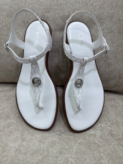 Pair of Michael Kors Mallory Signature Logo T-Strap Sandals in Bright White