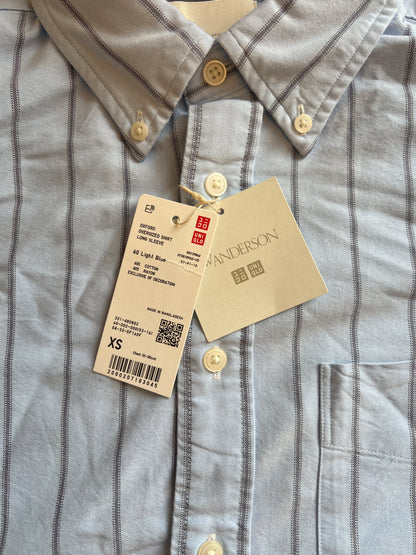 UNIQLO x JW Anderson Oxford Oversized Shirt in a striped light blue pattern