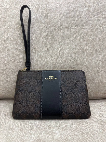 Coach Corner Zip Wristlet in Signature coated canvas and smooth leather