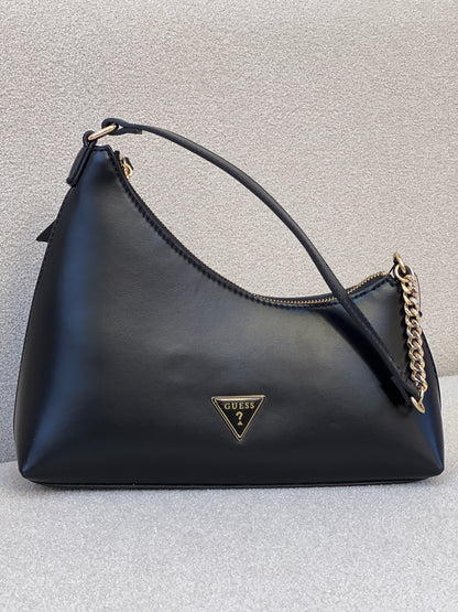 Black GUESS Noelle Top Zip Shoulder Bag, featured with gold-tone hardware and a combination chain and faux-leather shoulder strap