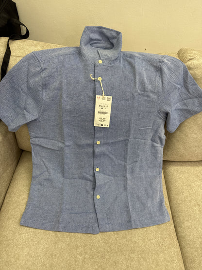 This blue textured long-sleeve shirt is a Zara brand