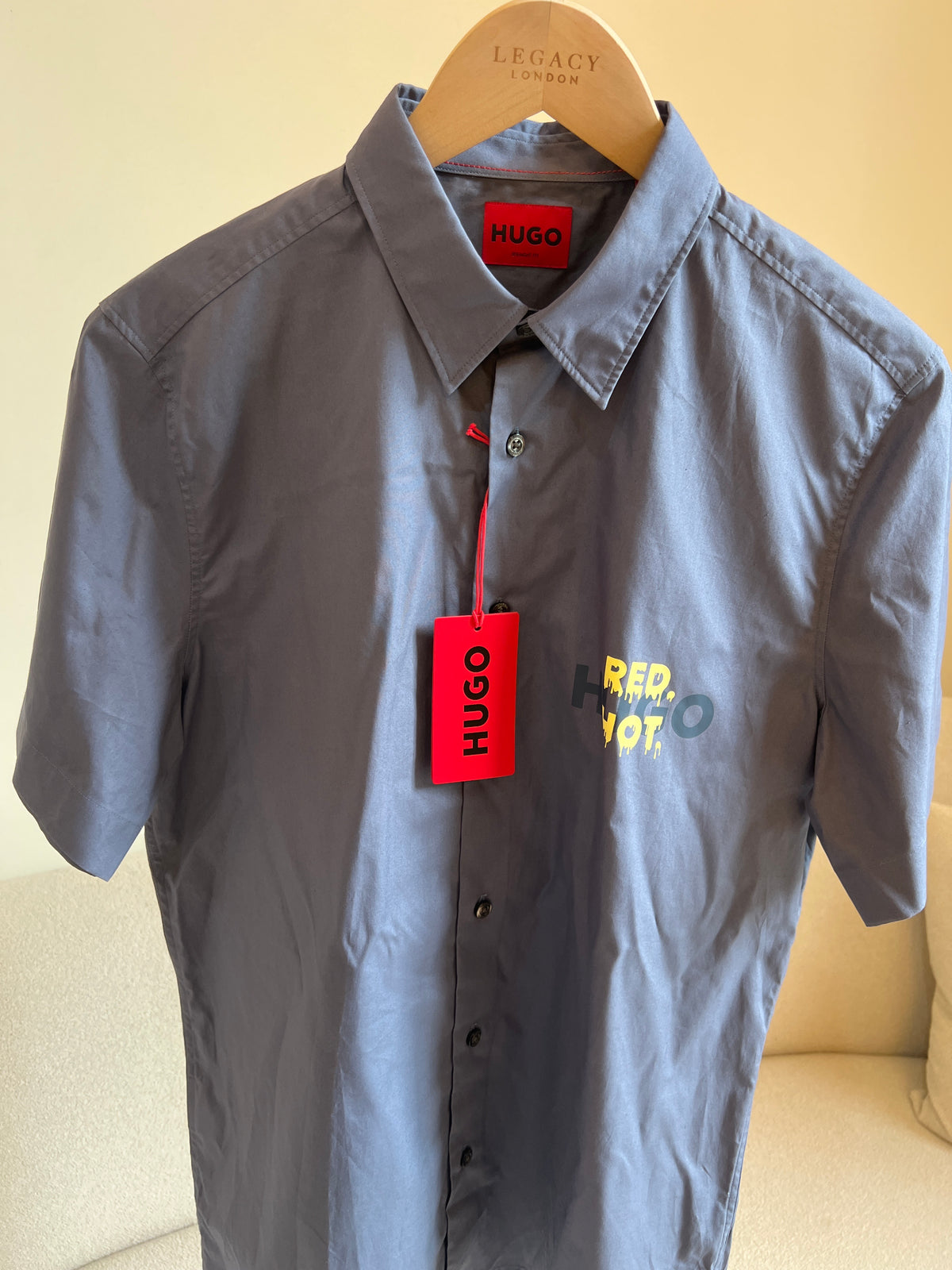 HUGO by Hugo Boss men's short-sleeve casual shirt, specifically the 'Ebor' style in a slate blue color featuring a "Red Hot" graphic