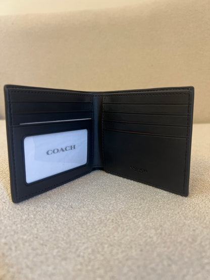 Coach ID Billfold Wallet in Signature Canvas, often found in Tan/Black or Mahogany