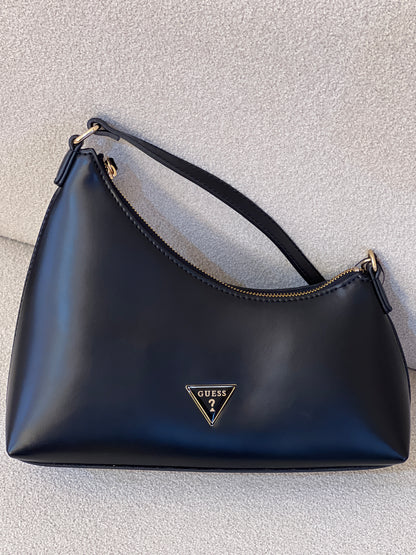 Black GUESS Noelle Top Zip Shoulder Bag, featured with gold-tone hardware and a combination chain and faux-leather shoulder strap