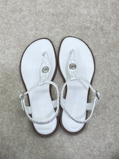 Pair of Michael Kors Mallory Signature Logo T-Strap Sandals in Bright White