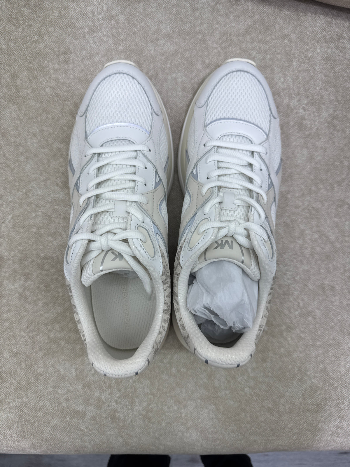 Michael Kors Leo Mixed-Media Trainer in the Vanilla Combo color