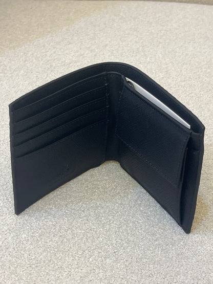 Armani Exchange bifold wallet, likely model 958098_CC838, featuring an all-over embossed logo design in black