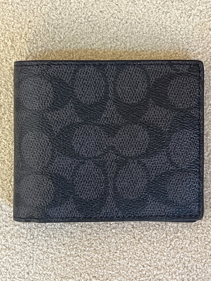 Appears to be a Coach Men's 3-in-1 Wallet in Signature Canvas.