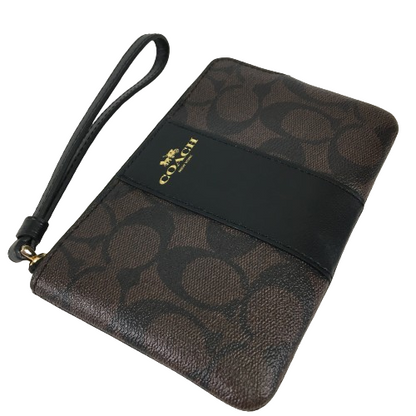 Coach Corner Zip Wristlet in Signature coated canvas and smooth leather