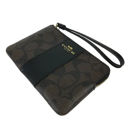 Coach Corner Zip Wristlet in Signature coated canvas and smooth leather