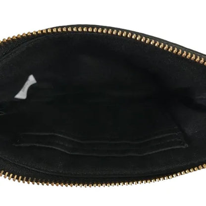 Coach Corner Zip Wristlet in Signature coated canvas and smooth leather