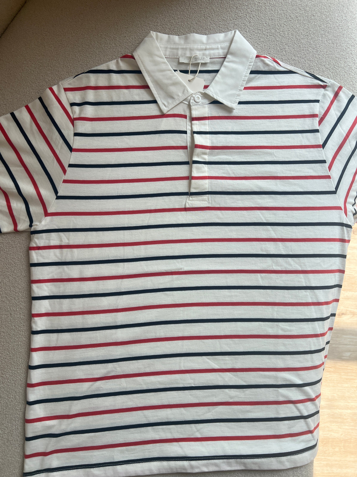 White polo ZARA T-shirt with red and black stripes, similar to those offered by brands like Liberty Blues or J.Crew Factory