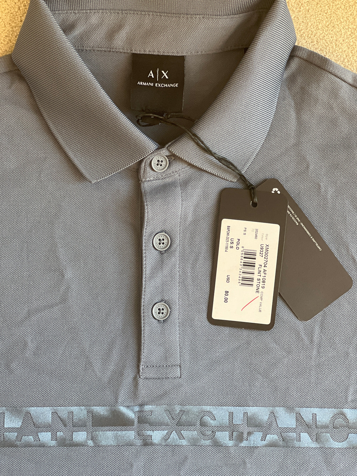 Armani Exchange logo-lettering polo T-shirt in cotton, available in  color blue