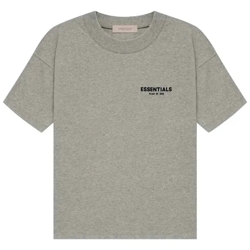Fear of God Essentials t-shirt in a grey colorway, potentially "Light Oatmeal" or "Dark Oatmeal