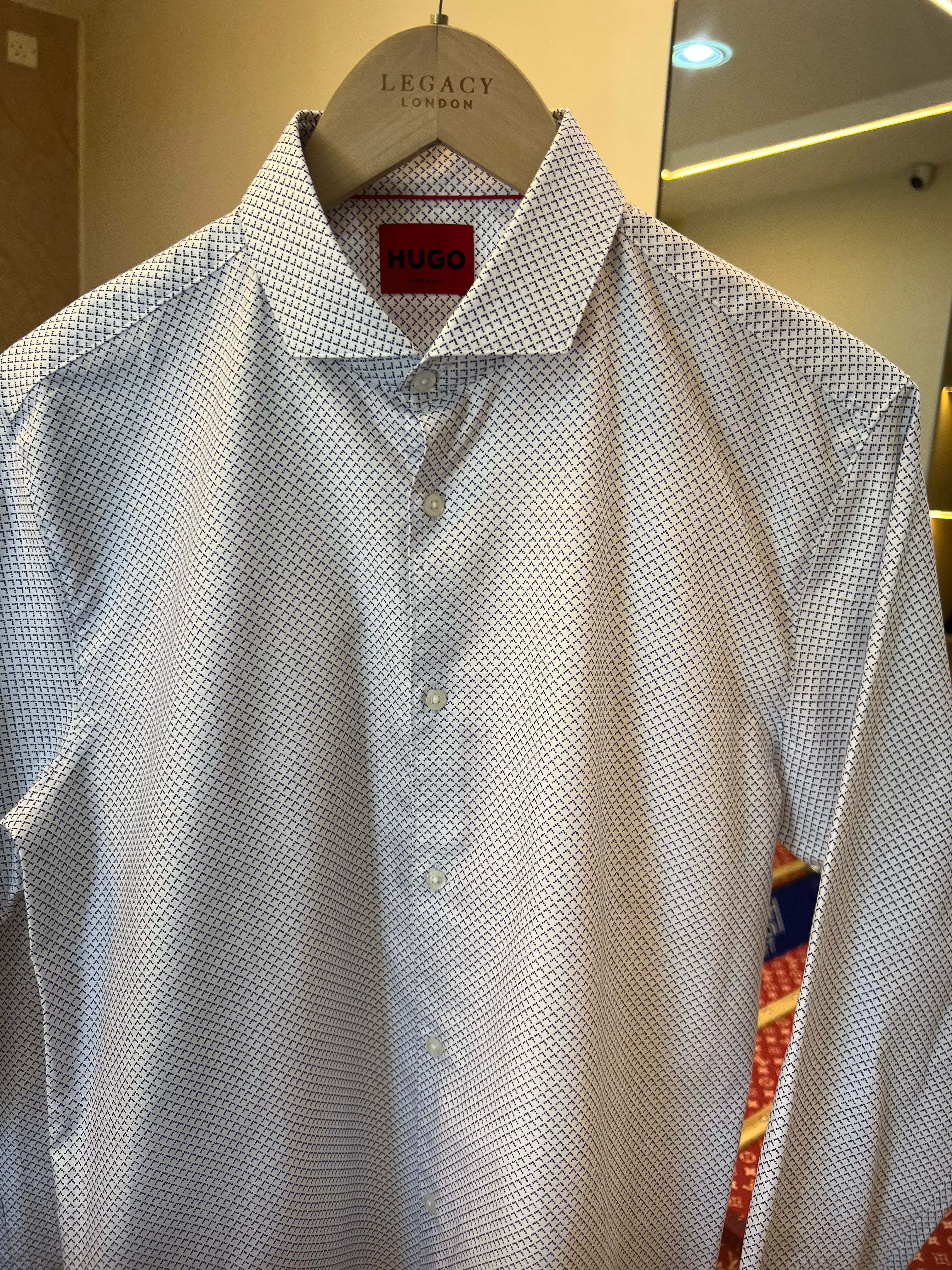 White HUGO menswear shirt featuring a distinctive all-over geometric print, likely the Kenno or Errik model