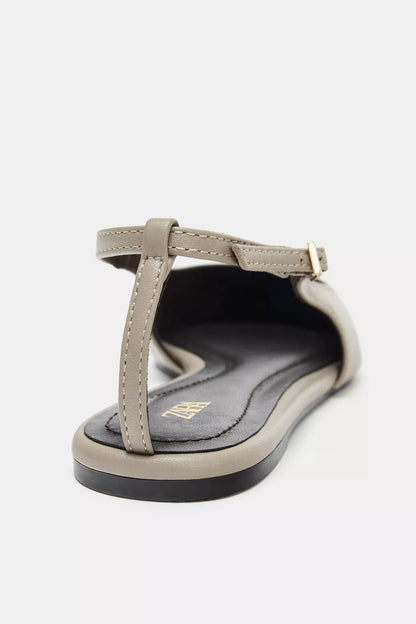 taupe leather slingback shoes are from Zara