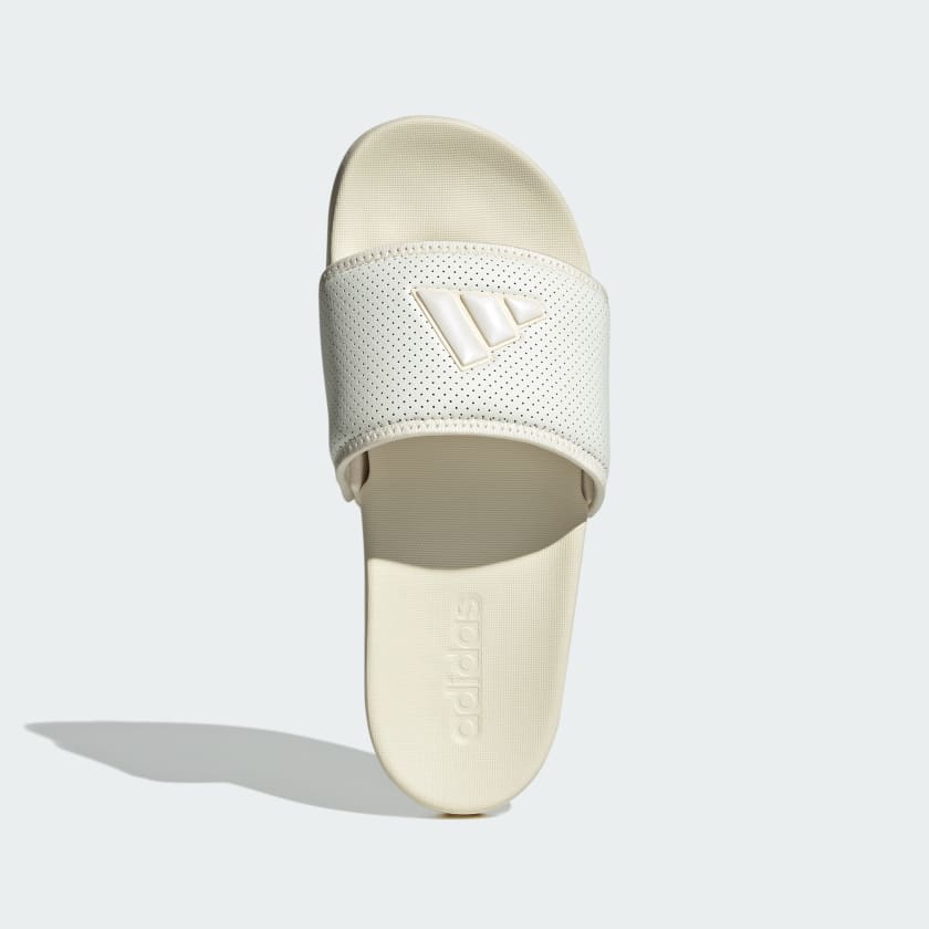 Adidas Adilette Comfort Slides in the white or off-white colorway