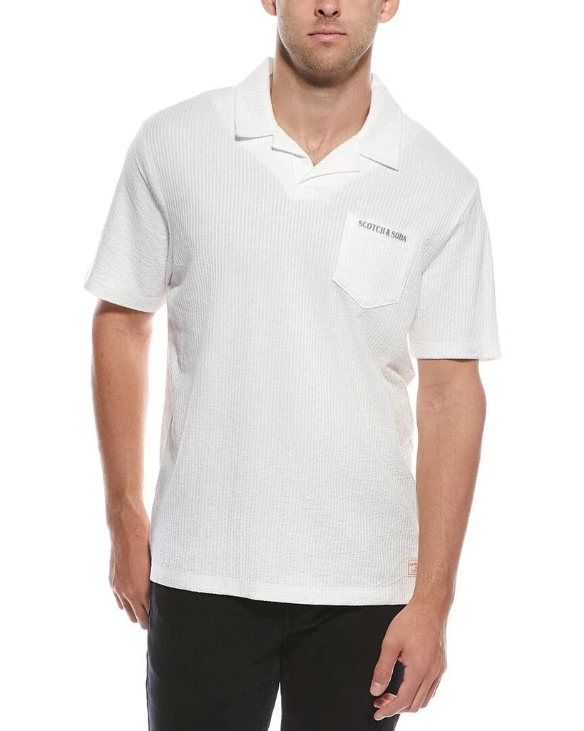 Scotch & Soda textured polo shirt features a distinctive chest pocket with embroidered branding